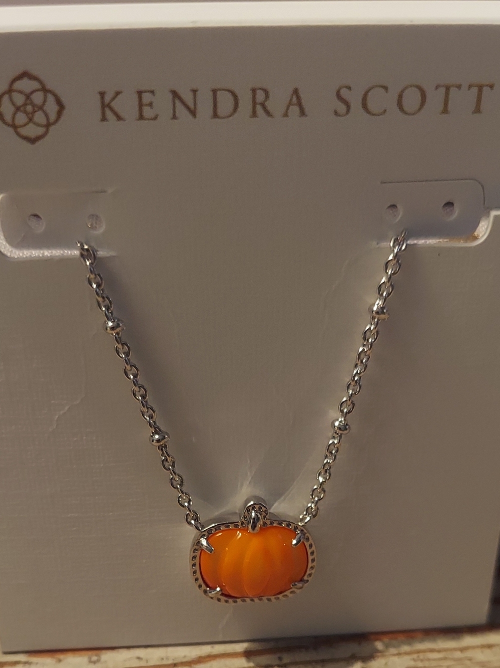 Kendra Scott Silver Necklace with Bright Orange Pumpkin Pendant